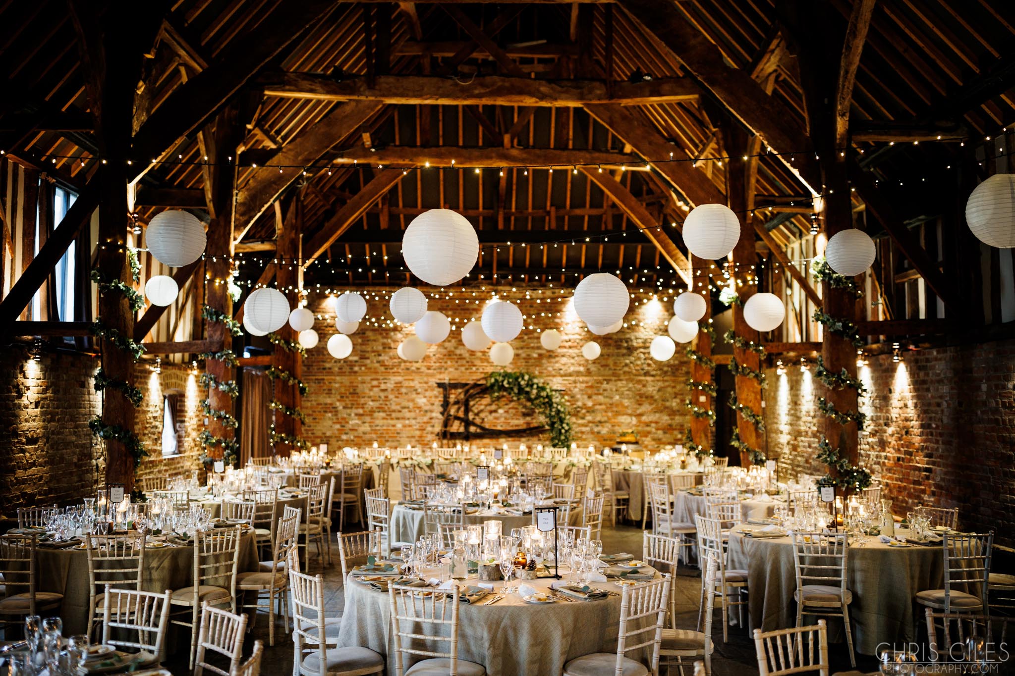 Cooling Caslte Barn Dressed with Lanterns at a Winter Wedding